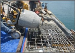 Clean area to be grouted (pilecap GL8). Apply bonding agent to pilecap. Use SikaMicrocrete 2000 to grouted Pilecap area